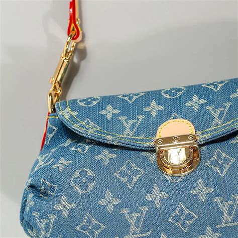 lv denim sling bag|Lv denim pleaty.